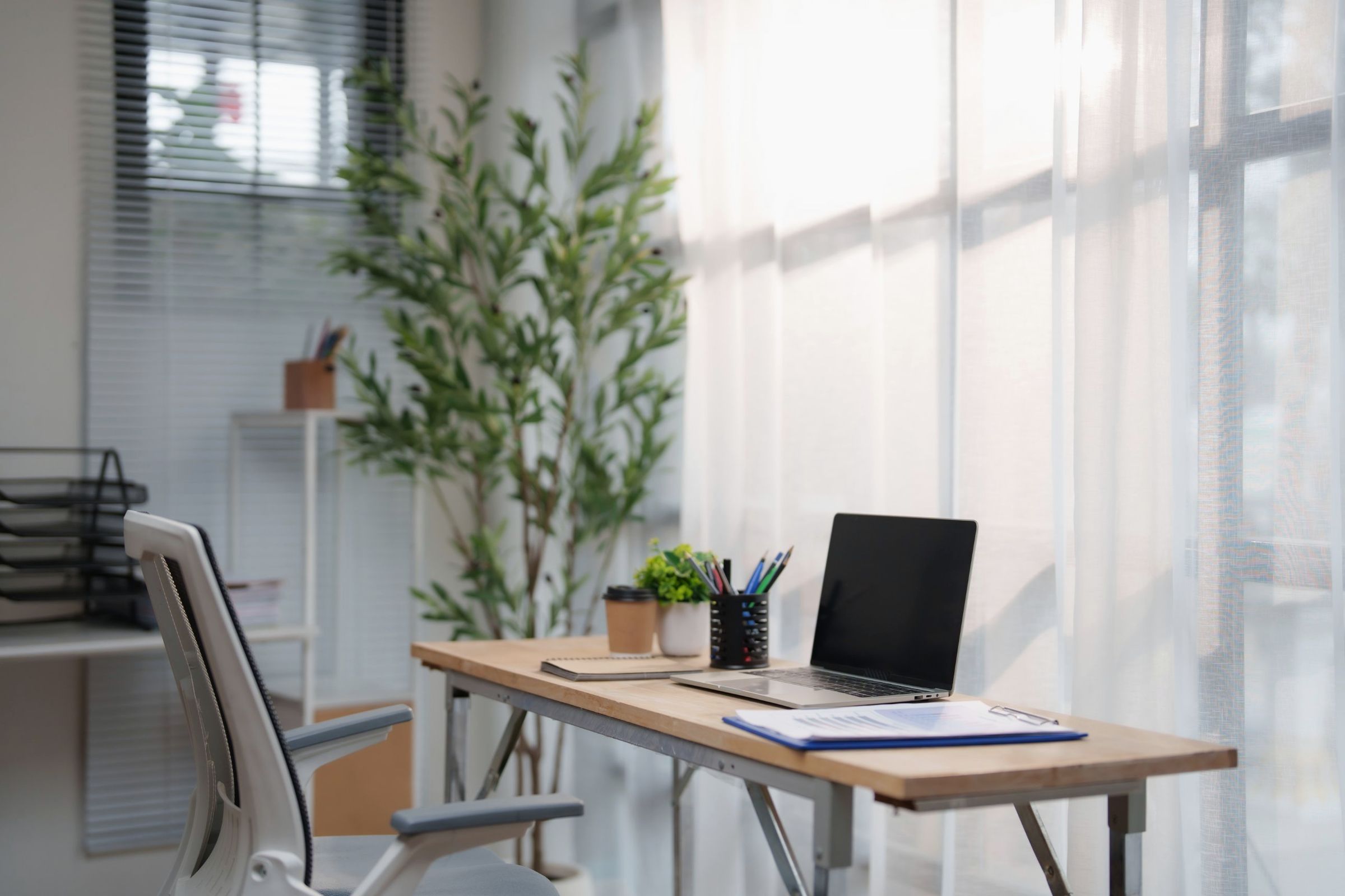 Home office workspace with desk and monitor
